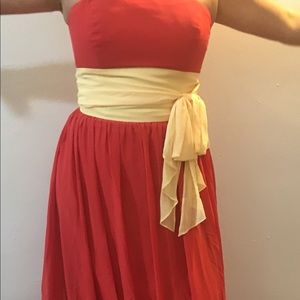 Orange and yellow long strapless dress
